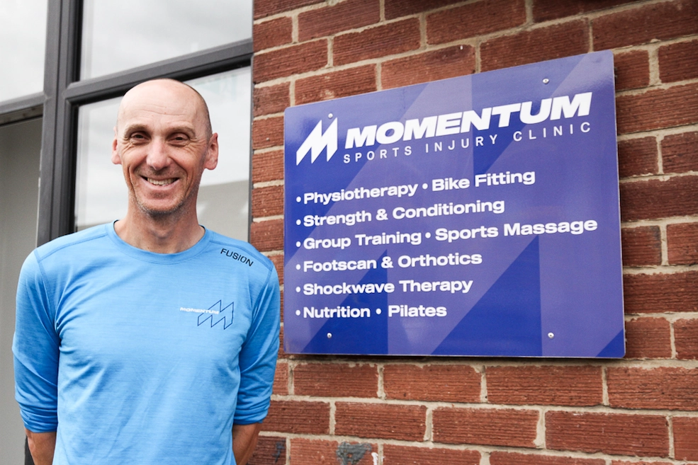 John Dennis outside Momentum Sports Injury Clinic