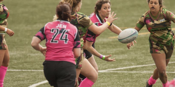 Kate Disley playing rugby