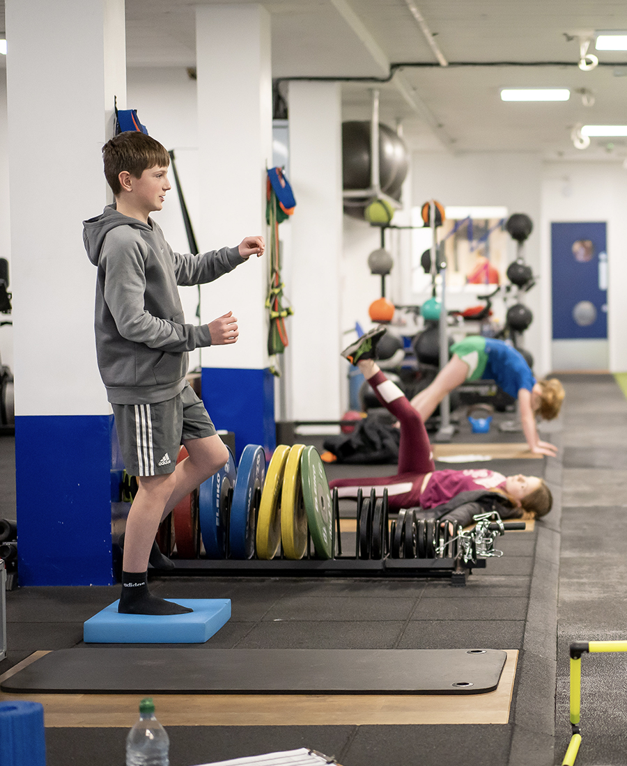 A young athlete doing an exercise