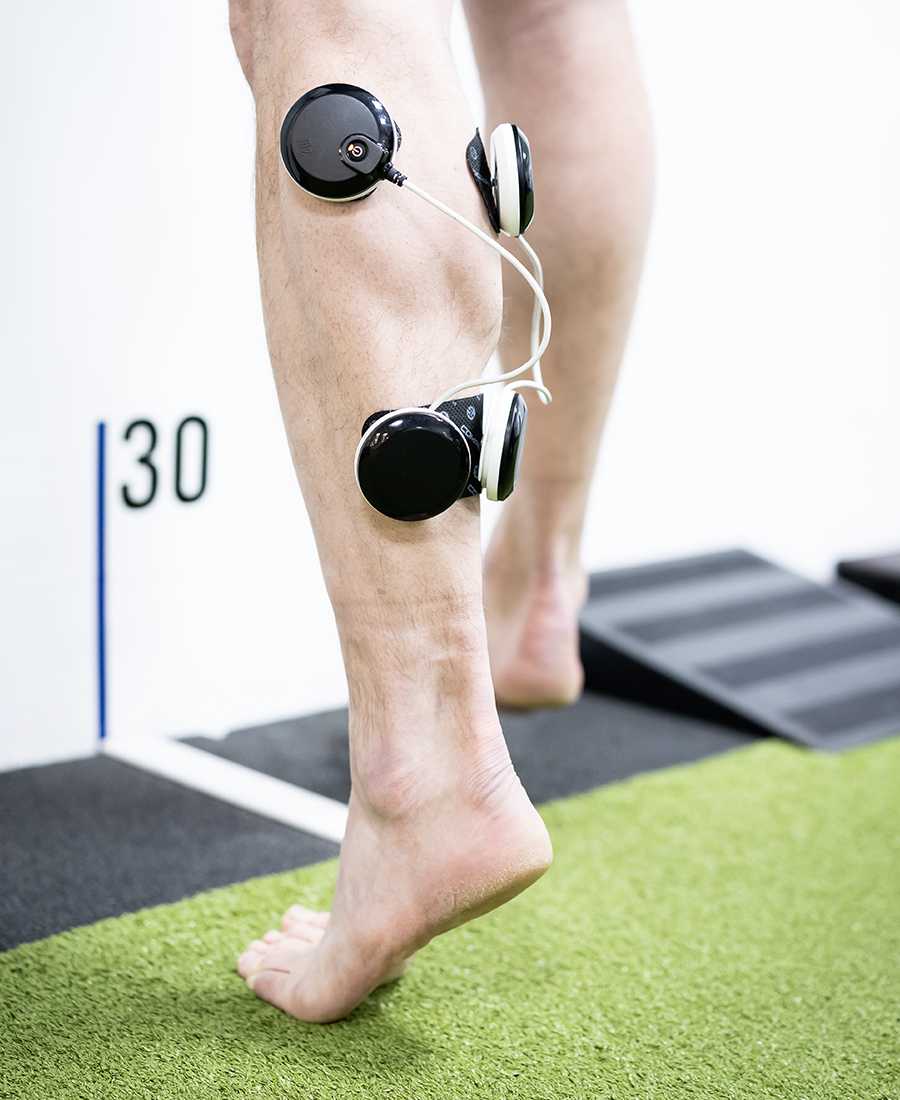 Sports injury clinic Jesmond - Sensors attached to a person's calf